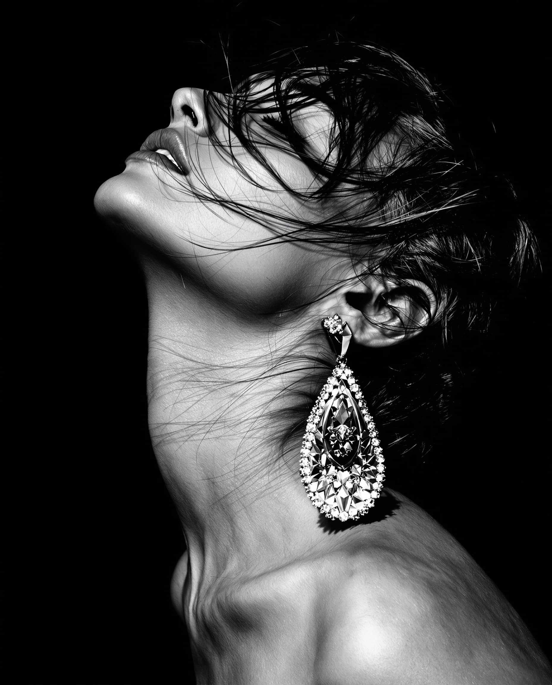 Editorial black and white portrait, moody studio lighting