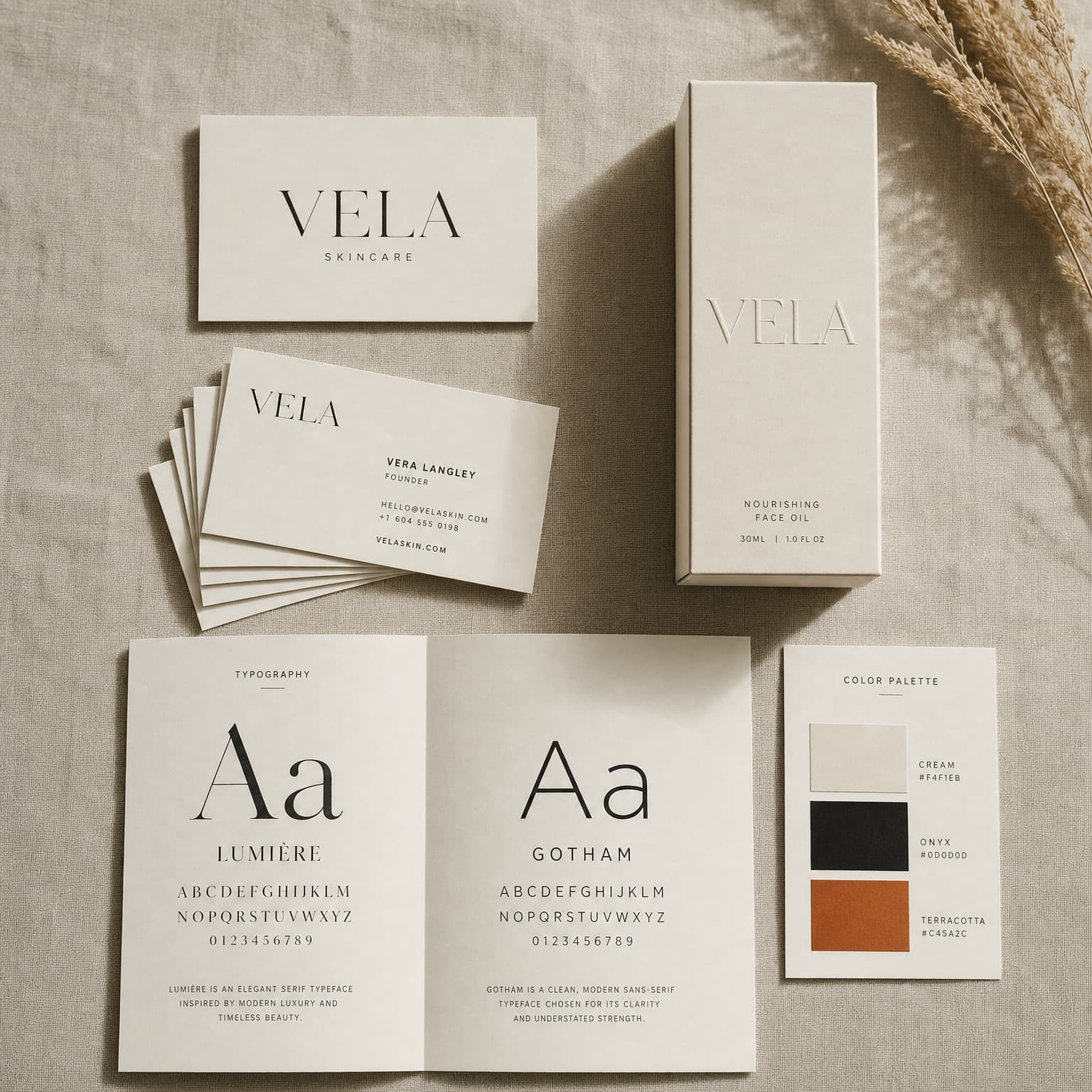 Conceptual brand identity presentation — logo, business cards, packaging and typography laid out flat